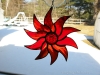 all red stained glass starburst pinwheel