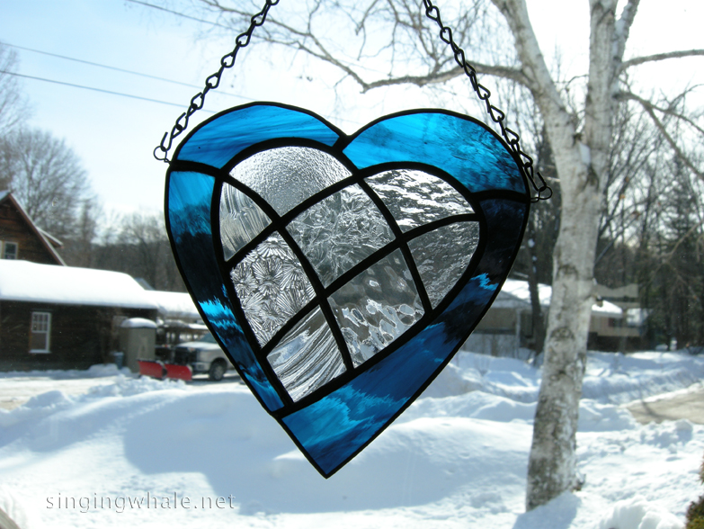 stained glass blue heart with inlaid clear patchwork heart